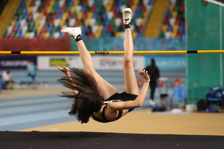 ISTANBUL, TURKEY - FEBRUARY 14, 2021: Undefined athlete high jumping during Turkish Athletic Federation Threshold Competitionsのeditorial素材
