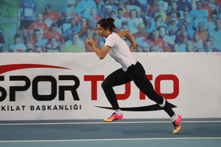 ISTANBUL, TURKEY - FEBRUARY 14, 2021: Undefined athlete running during Turkish Athletic Federation Olympic Threshold Competitionsのeditorial素材