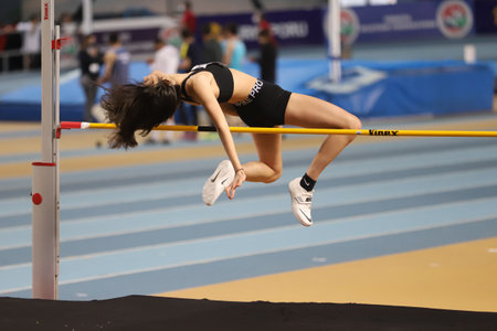 ISTANBUL, TURKEY - FEBRUARY 14, 2021: Undefined athlete high jumping during Turkish Athletic Federation Threshold Competitionsのeditorial素材