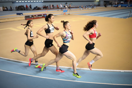 ISTANBUL, TURKEY - MARCH 07, 2021: Athletes running during Turkish Athletic Federation Combined Track and Field Competitions Championshipsのeditorial素材