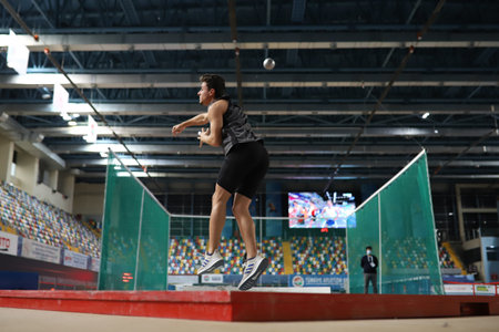 ISTANBUL, TURKEY - MARCH 06, 2021: Undefined athlete shot put during Turkish Athletic Federation Combined Track and Field Competitions Championshipsのeditorial素材