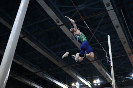 ISTANBUL, TURKEY - MARCH 07, 2021: Undefined athlete pole vaulting during Turkish Athletic Federation Combined Track and Field Competitions Championshipsのeditorial素材