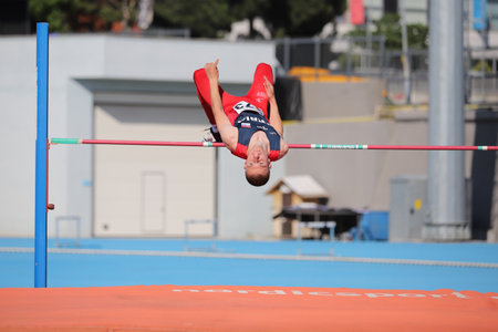 ISTANBUL, TURKEY - JUNE 12, 2021: Undefined athlete high jumping during Balkan U20 Athletics Championshipsのeditorial素材