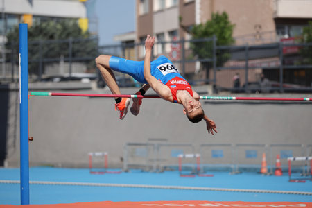 ISTANBUL, TURKEY - JUNE 12, 2021: Undefined athlete high jumping during Balkan U20 Athletics Championshipsのeditorial素材