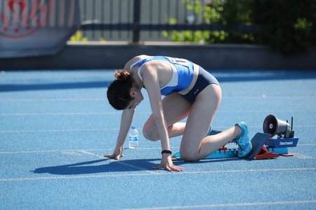 ISTANBUL, TURKEY - JUNE 12, 2021: Undefined athlete running during Balkan U20 Athletics Championshipsのeditorial素材