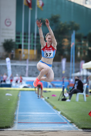 ISTANBUL, TURKEY - JUNE 13, 2021: Undefined athlete long jumping during Balkan U20 Athletics Championshipsのeditorial素材
