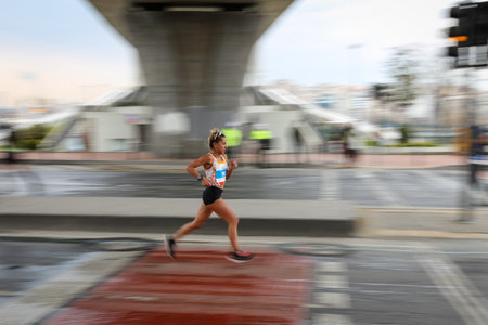 ISTANBUL, TURKEY - APRIL 04, 2021: Athlete running Istanbul Half Marathon in old town of Istanbulのeditorial素材