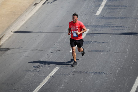 IZMIR, TURKEY - APRIL 11, 2021: Athlete running Marathon Izmir