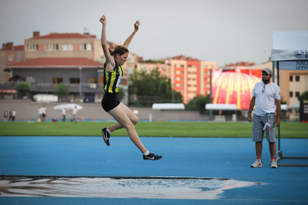 ISTANBUL, TURKEY - JUNE 23, 2021: Undefined athlete running 3000 metres steeplechase during Turkish Athletic Federation Cezmi Or Cupのeditorial素材