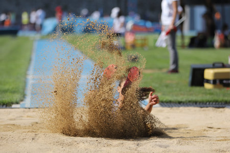 ISTANBUL, TURKEY - AUGUST 07, 2021: Undefined athlete triple jumping during Turkish Athletic...