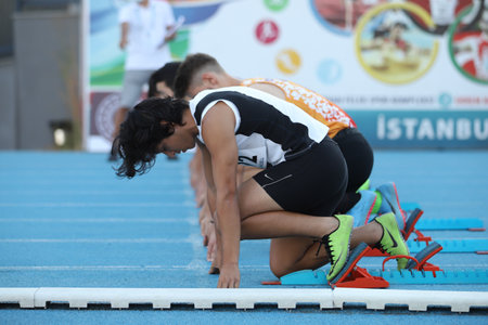 ISTANBUL, TURKEY - AUGUST 07, 2021: Athletes running 100 metres during Turkish Athletic Federation Olympic Threshold Competitionsのeditorial素材