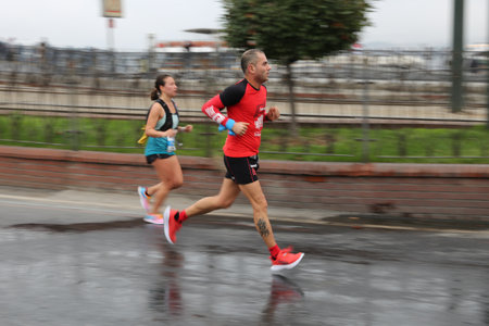 ISTANBUL, TURKEY - NOVEMBER 07, 2021: Athletes running in 43. Istanbul marathon which includes two continents in one race.のeditorial素材