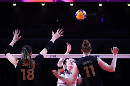 ANKARA, TURKEY - DECEMBER 19, 2021: Zehra Gunes and Isabelle Haak in action during Vakifbank vs Imoco Volley Conegliano final match of FIVB Volleyball Womens Club World Championshipのeditorial素材