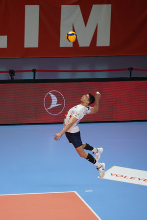 ISTANBUL, TURKEY - MARCH 26, 2022: Oguzhan Tarakci serves during Galatasaray vs Altekma SK Turkish Mens Volleyball League match in Burhan Felek Sport Hallのeditorial素材