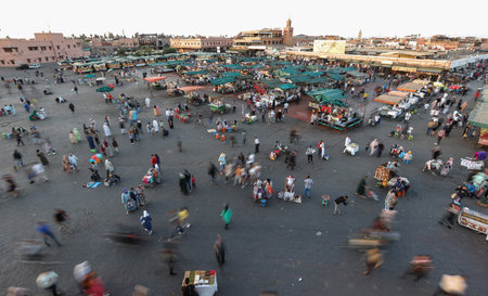 MARRAKESH, MOROCCO - OCTOBER 29, 2021: People in Jemaa el-Fnaa where main square of Marrakesh, used by locals and touristsのeditorial素材