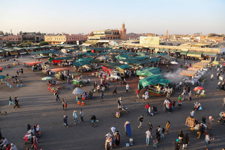 MARRAKESH, MOROCCO - OCTOBER 29, 2021: People in Jemaa el-Fnaa where main square of Marrakesh, used by locals and touristsのeditorial素材