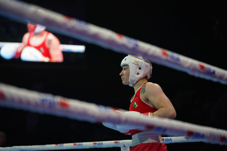 ISTANBUL, TURKEY - MAY 19, 2022: Broadhurst Amy Sara (Red) and Khelif Imane (Blue) compete during IBA Womens World Boxing Championshipsのeditorial素材