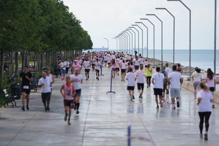 ISTANBUL, TURKIYE - JUNE 18, 2022: People running in colors during Color Run Maltepe 7K Run