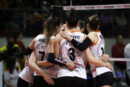 ISTANBUL, TURKEY - JANUARY 30, 2022: Eczacibasi players celebrating score point during Turkish Airlines Turkish Sultans League match in Burhan Felek Sport Hallのeditorial素材