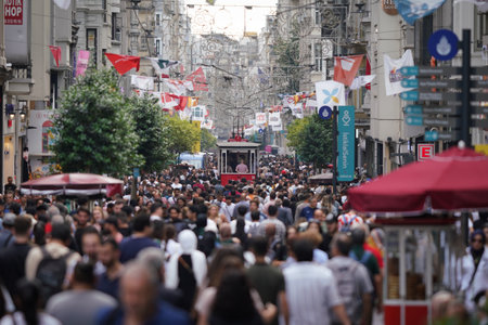 ISTANBUL, TURKIYE - JUNE 11, 2022: People on Istiklal Avenue where the most popular destination of Istanbul for shopping and entertainment.のeditorial素材
