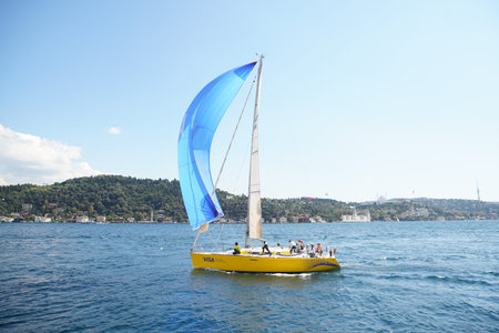 ISTANBUL, TURKIYE - SEPTEMBER 24, 2022: Sailboat competing in Bosphorus Cup