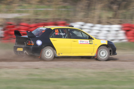 KOCAELI, TURKEY - DECEMBER 26, 2021: Serdar Kaan Yalcin drives Mitsubishi Lancer Evo IX during Turkish Rallycross Championships.のeditorial素材