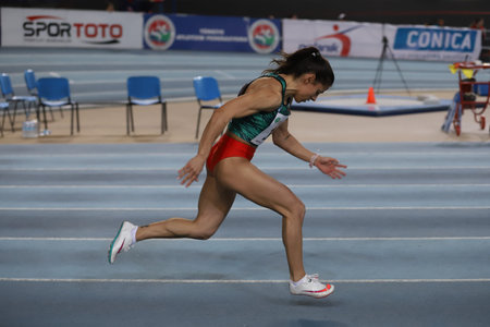 ISTANBUL, TURKEY - MARCH 05, 2022: Undefined athlete running 60 metres during Balkan Athletics...