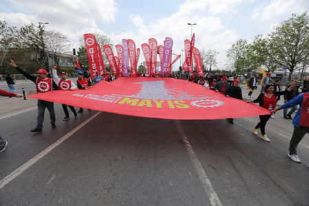ISTANBUL, TURKEY - MAY 01, 2022: People march in International Workers Dayのeditorial素材