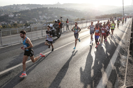 ISTANBUL, TURKEY - NOVEMBER 06, 2022: Athletes running in 44. Istanbul marathon which includes two continents in one race.のeditorial素材