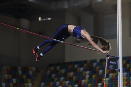 ISTANBUL, TURKEY - MARCH 05, 2022: Undefined athlete pole vaulting during Balkan Athletics Indoor Championships in Atakoy Athletics Arenaのeditorial素材