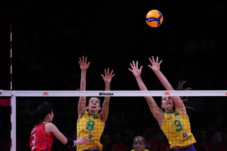 ANKARA, TURKIYE - JULY 13, 2022: Silva Carneiro Macris Fernanda and Gambatto Kudiess Julia in action during Brazil vs Japan VNL Quarter Final match in Ankara Arenaのeditorial素材