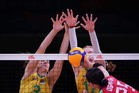 ANKARA, TURKIYE - JULY 13, 2022: Gambatto Kudiess Julia and Bergmann Julia Isabelle in action during Brazil vs Japan VNL Quarter Final match in Ankara Arenaのeditorial素材