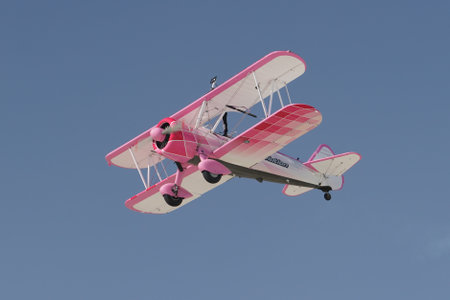 ESKISEHIR, TURKIYE - SEPTEMBER 18, 2022: Boeing PT-13D Kaydet (75-5099) Wing walking show display in Sivrihisar SHG Airshowのeditorial素材