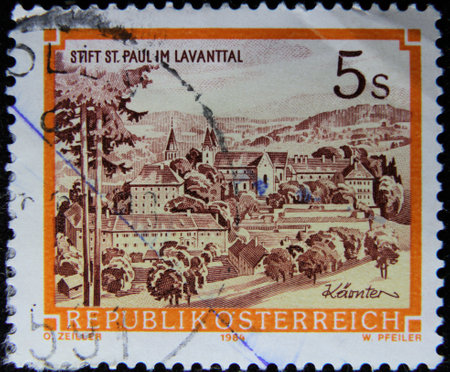 ISTANBUL, TURKEY - DECEMBER 27, 2020: Austrian stamp shows Benedictine Abbey of St. Paul, Levanttal circa 1984のeditorial素材