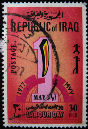 ISTANBUL, TURKEY - DECEMBER 26, 2020: Iraq stamp shows Labor Day circa 1977のeditorial素材