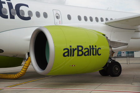 ISTANBUL, TURKIYE - OCTOBER 08, 2022: Engine of Air Baltic Airbus A220-371 (55165) display in...