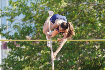 DENIZLI, TURKIYE - JULY 16, 2022: Undefined athlete pole vaulting during Balkan Athletics U20 Championships in Denizli Albayrak Athletics Trackのeditorial素材