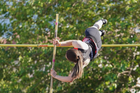 DENIZLI, TURKIYE - JULY 16, 2022: Undefined athlete pole vaulting during Balkan Athletics U20...