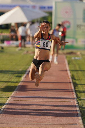 DENIZLI, TURKIYE - JULY 16, 2022: Undefined athlete triple jumping during Balkan Athletics U20 Championships in Denizli Albayrak Athletics Trackのeditorial素材