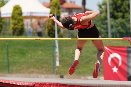 DENIZLI, TURKIYE - JULY 16, 2022: Undefined athlete high jumping during Balkan Athletics U20...