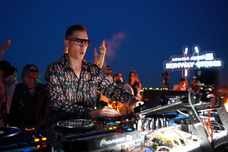 ISTANBUL, TURKIYE - JUNE 21, 2023: DJ Performs during Longest Day event in Istanbul Grand Airport