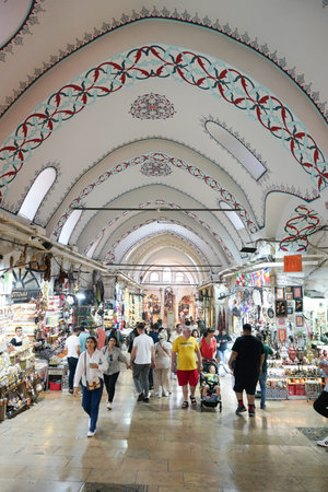ISTANBUL, TURKIYE - JULY 13, 2023: People shopping in the Grand Bazaar. The Grand Bazaar is one of...