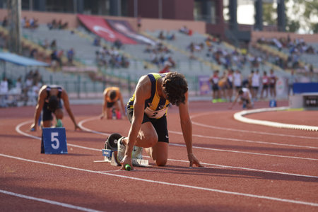 IZMIR, TURKIYE - JULY 05, 2023: Athletes running 4x400 metres relay during Super League Competitions...