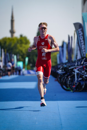 BALIKESIR, TURKIYE - AUGUST 05, 2023: Undefined athlete competing in running component of Europe Triathlon Sprint and Relay Championships in Balikesirのeditorial素材
