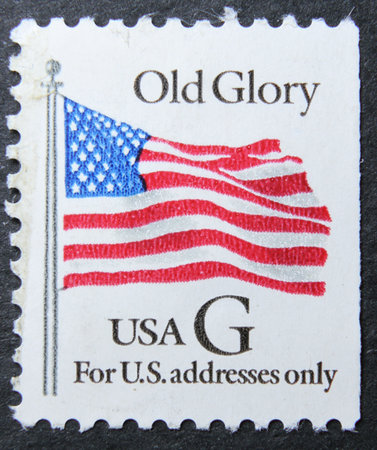 ISTANBUL, TURKEY - JANUARY 24, 2021: United States stamp shows US flagのeditorial素材