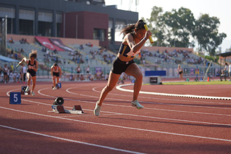 IZMIR, TURKIYE - JULY 05, 2023: Athletes running 4x400 metres relay during Super League Competitions...