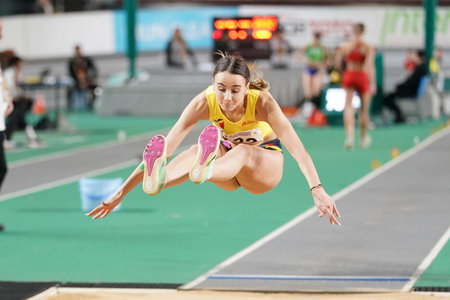 ISTANBUL, TURKIYE - FEBRUARY 10, 2024: Undefined athlete long jumping during Balkan Athletics...