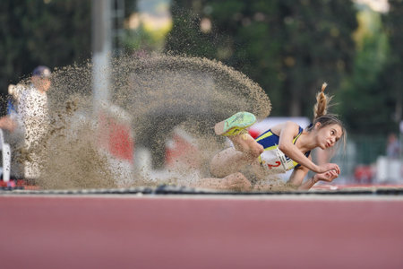 IZMIR, TURKIYE - JULY 04, 2023: Undefined athlete triple jumping during Super League Competitions in...