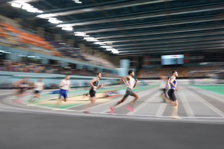 ISTANBUL, TURKIYE - FEBRUARY 17, 2024: Athletes running during Turkish Indoor Athletics Championships in Atakoy Athletics Arenaのeditorial素材