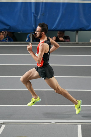 ISTANBUL, TURKIYE - FEBRUARY 10, 2024: Undefined athlete running during Balkan Athletics...